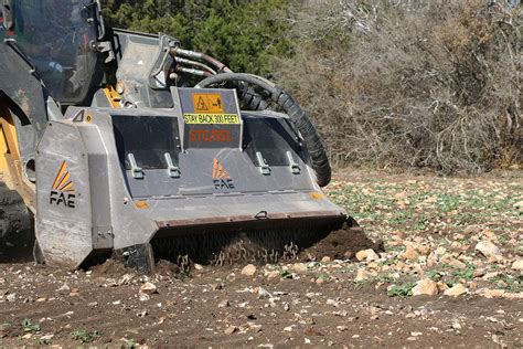 fae skid steer rock crusher price|skid steer stone crusher.